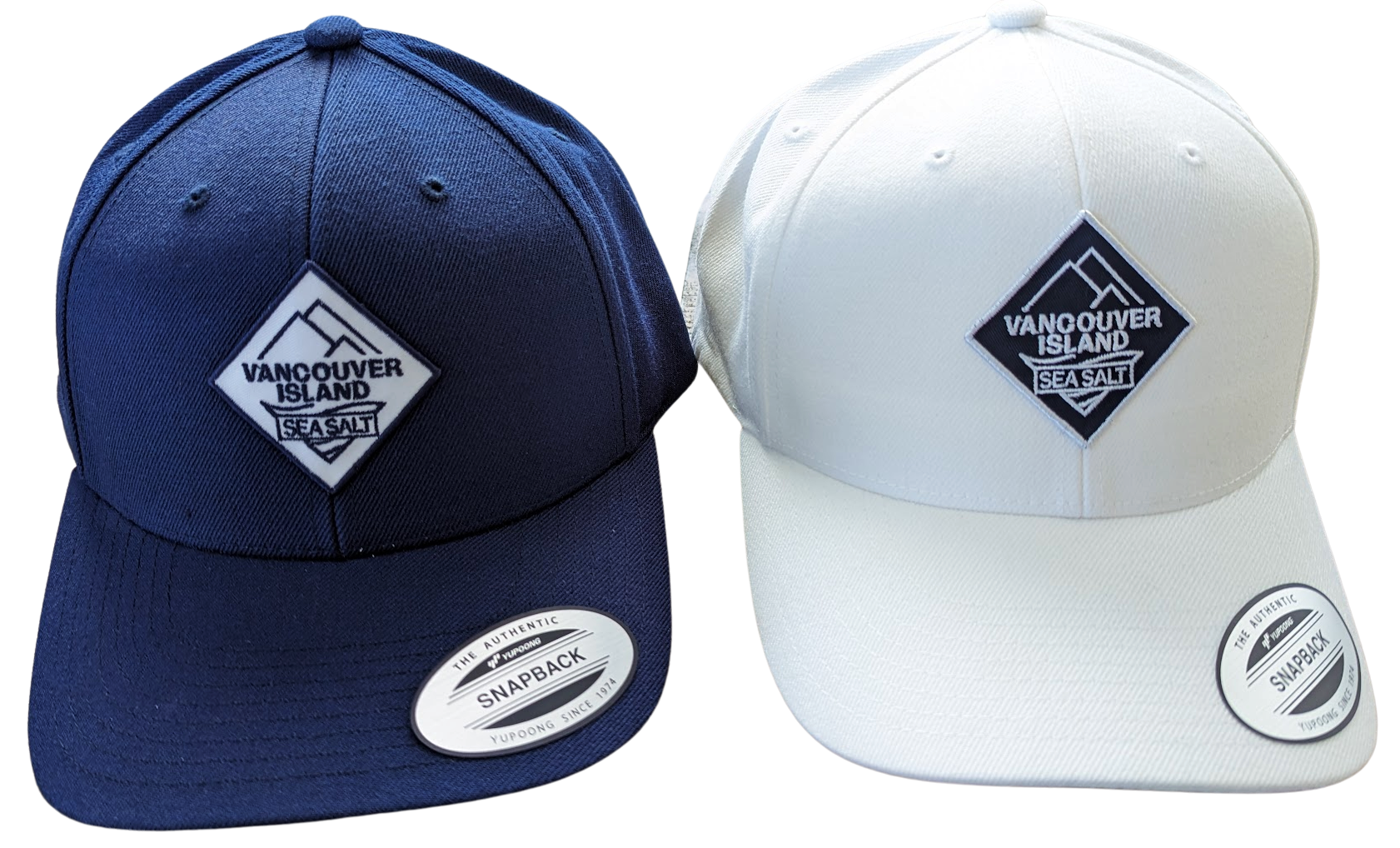 Two logo hats, one blue and one white, with curved brims and snapback closures, featuring a diamond-shaped logo on the front.