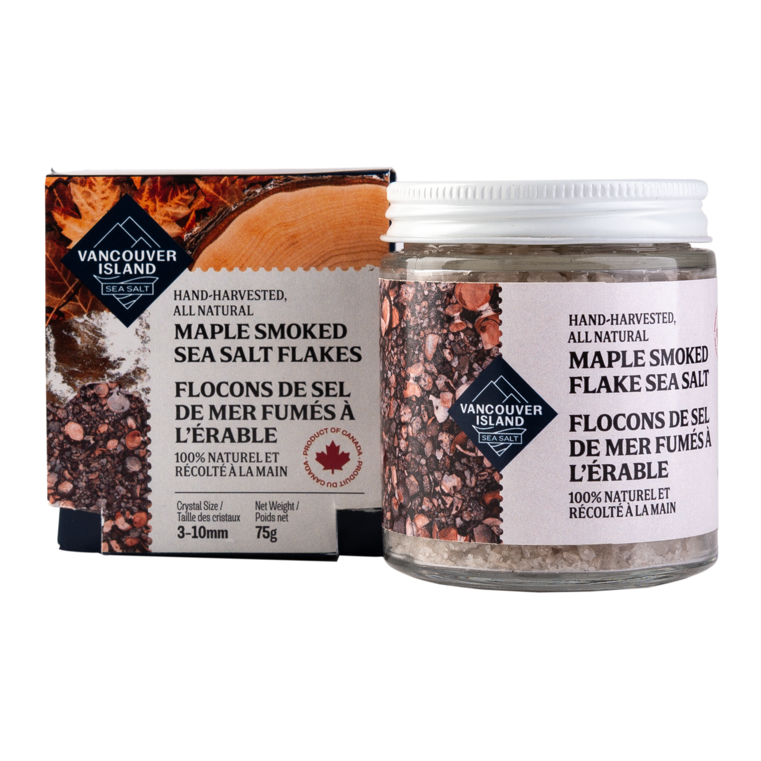 A packaged product of Vancouver Island Salt Co. featuring a clear jar with maple smoked flake sea salt and a label showing the brand and product name, as well as the Canadian maple wood used for smoking.