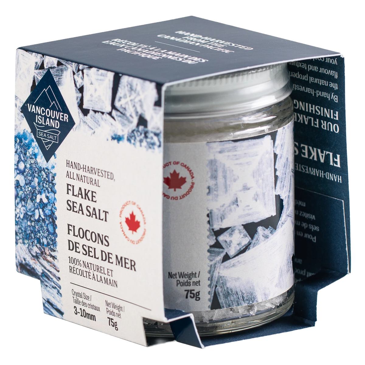 Glass jar of Vancouver Island flake sea salt sliding out of its printed sleeve, 75 g
