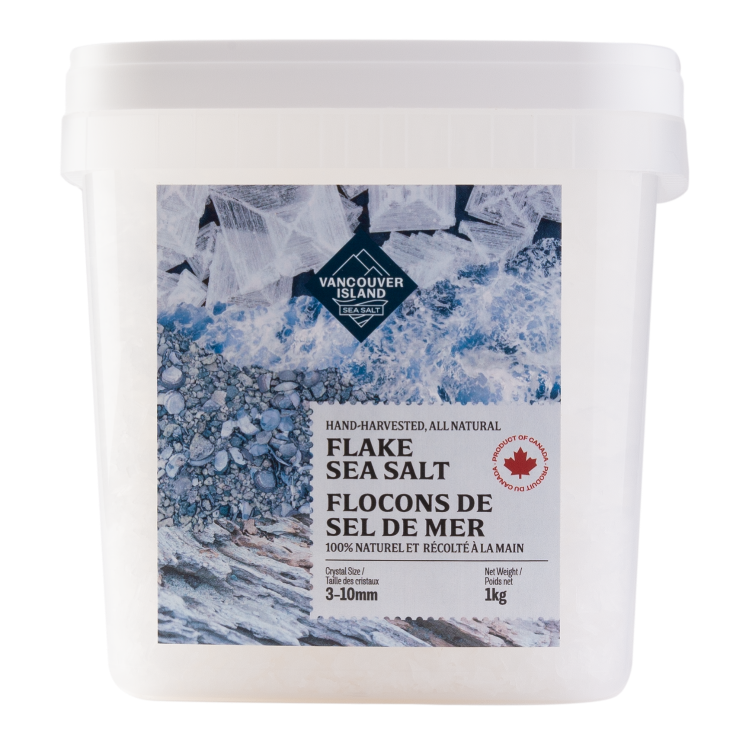 A white plastic bucket labeled with Flake Sea Salt, indicating it is hand-harvested, all natural sea salt in a flake form, packaged for culinary use.